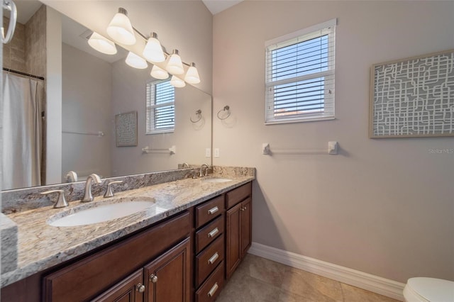 14901 17th Ave E, Bradenton, FL 34212 - full bath with double vanity, tile patterned flooring, and a shower with curtain