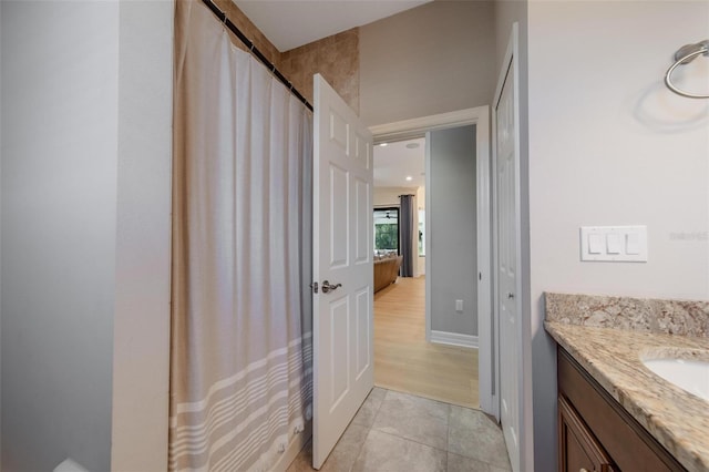 14901 17th Ave E, Bradenton, FL 34212 - full bath featuring vanity, tile patterned flooring, and curtained shower