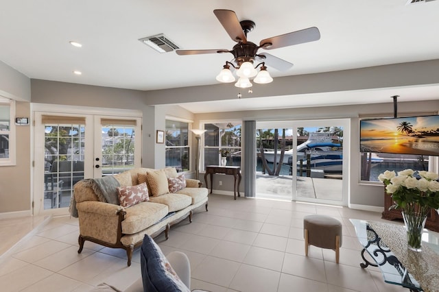 3715 101st St W, Bradenton, FL 34210 - living room featuring french doors, light tile patterned floors, recessed lighting, and ceiling fan