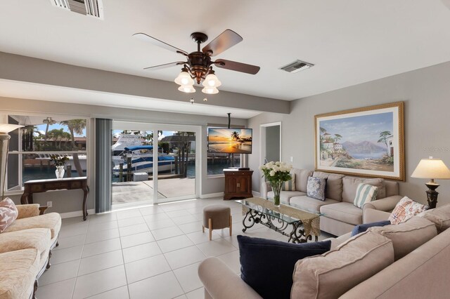 3715 101st St W, Bradenton, FL 34210 - living room with ceiling fan and tile patterned floors