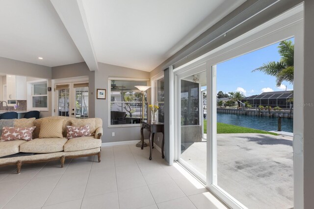 3715 101st St W, Bradenton, FL 34210 - sunroom / solarium featuring a water view, healthy amount of natural light, and french doors