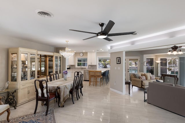3715 101st St W, Bradenton, FL 34210 - dining area with a chandelier and ceiling fan