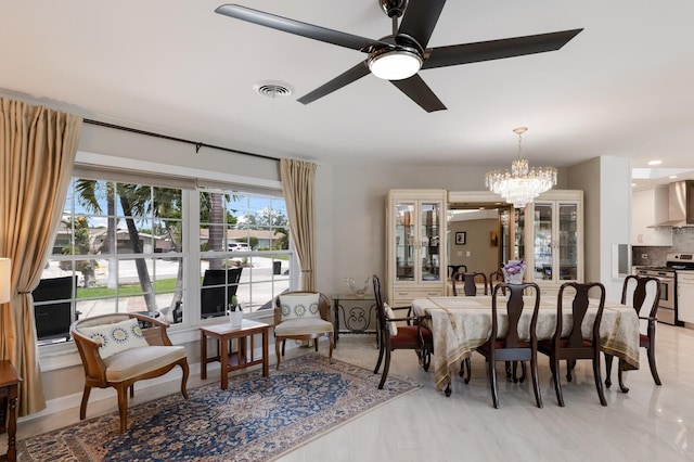3715 101st St W, Bradenton, FL 34210 - dining area with a chandelier and ceiling fan