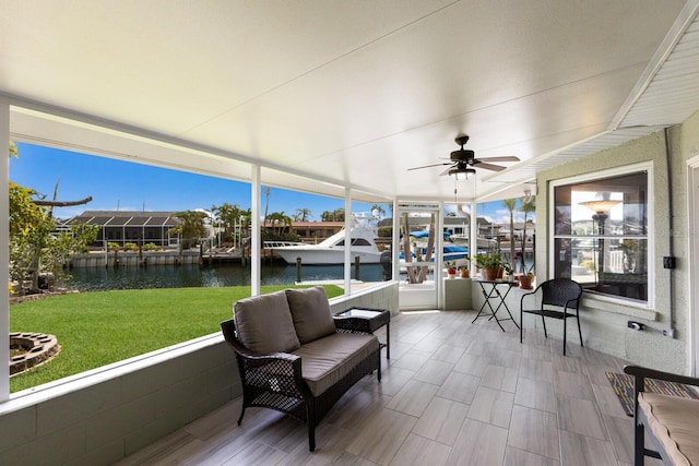 3715 101st St W, Bradenton, FL 34210 - sunroom featuring a water view, ceiling fan, and an outdoor hangout area