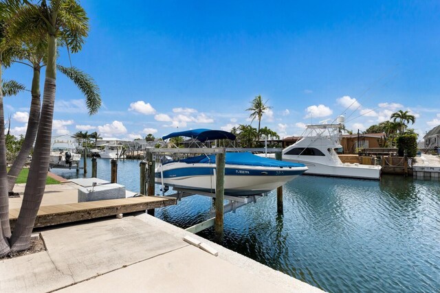 3715 101st St W, Bradenton, FL 34210 - dock area with boat lift and a water view