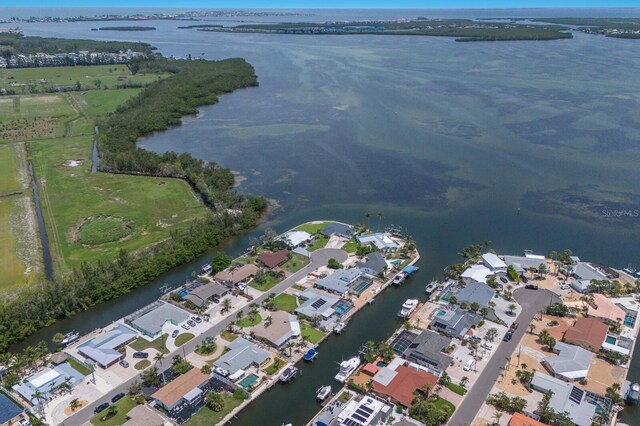 3715 101st St W, Bradenton, FL 34210 - aerial view of property and surrounding area featuring a large body of water and nearby suburban area