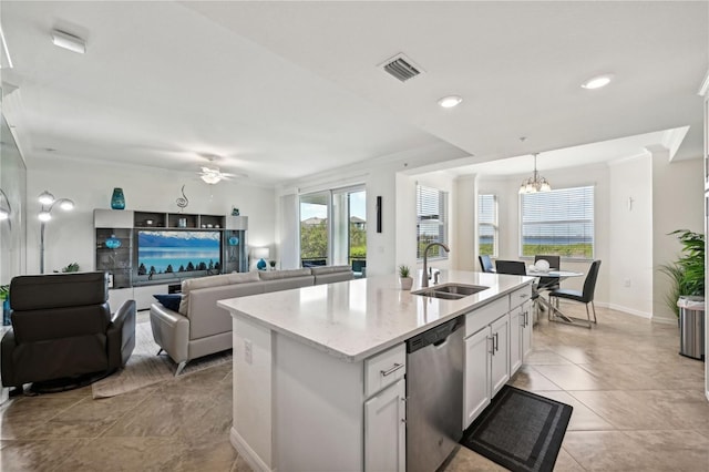 850 Tidewater Shores Loop Unit 102, Bradenton, FL 34208 - kitchen with dishwasher, ceiling fan, ornamental molding, white cabinetry, and a chandelier