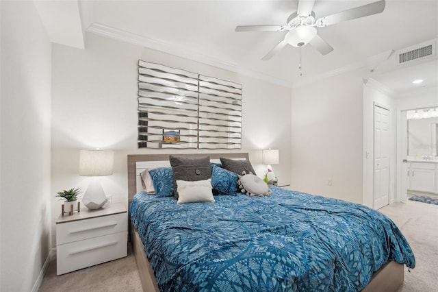 850 Tidewater Shores Loop Unit 102, Bradenton, FL 34208 - bedroom with carpet floors, ornamental molding, ensuite bath, and a ceiling fan