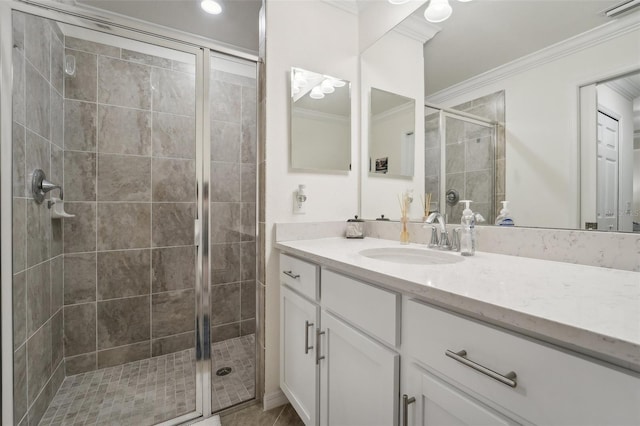 850 Tidewater Shores Loop Unit 102, Bradenton, FL 34208 - bathroom featuring ornamental molding, a shower stall, and vanity