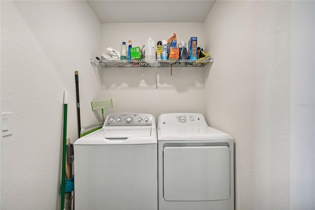 850 Tidewater Shores Loop Unit 102, Bradenton, FL 34208 - laundry room with washing machine and clothes dryer