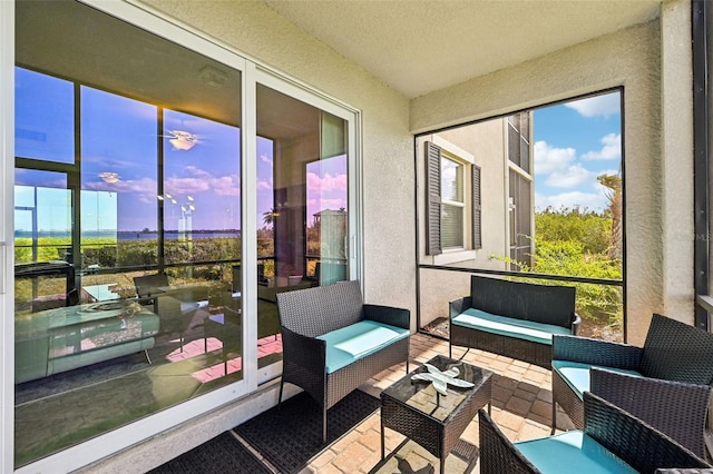 850 Tidewater Shores Loop Unit 102, Bradenton, FL 34208 - sunroom featuring outdoor lounge area