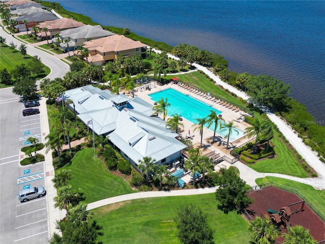 850 Tidewater Shores Loop Unit 102, Bradenton, FL 34208 - drone / aerial view of a pool area and a large body of water