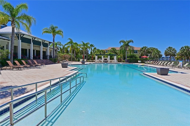 850 Tidewater Shores Loop Unit 102, Bradenton, FL 34208 - community pool with a patio