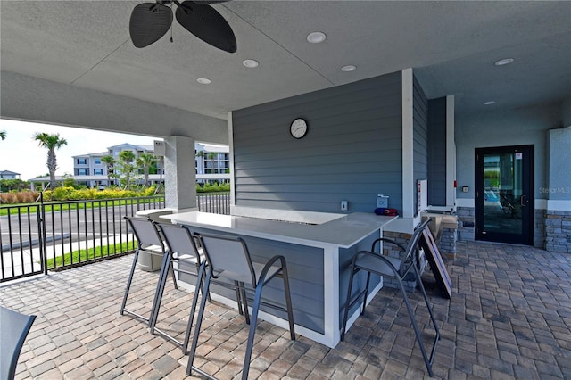 850 Tidewater Shores Loop Unit 102, Bradenton, FL 34208 - view of patio featuring a ceiling fan