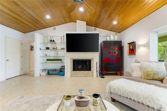 4852 Peregrine Point Cir N, Sarasota, FL 34231 - living area featuring vaulted ceiling, wood ceiling, ceiling fan, a fireplace, and recessed lighting