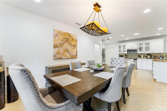4852 Peregrine Point Cir N, Sarasota, FL 34231 - dining area with recessed lighting