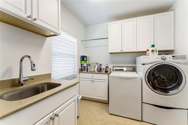4852 Peregrine Point Cir N, Sarasota, FL 34231 - washroom with independent washer and dryer and cabinet space