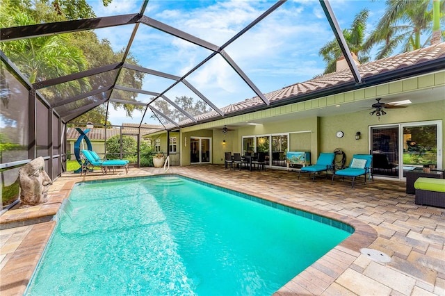 4852 Peregrine Point Cir N, Sarasota, FL 34231 - outdoor pool featuring ceiling fan, a patio area, and a lanai