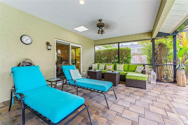 4852 Peregrine Point Cir N, Sarasota, FL 34231 - sunroom with a ceiling fan, an outdoor living space, and a skylight