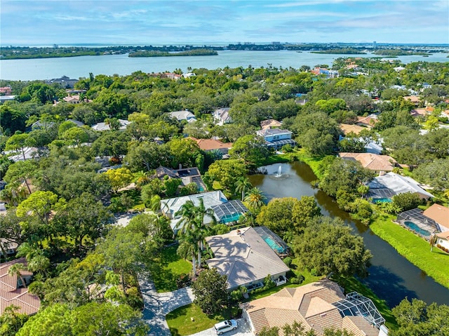 4852 Peregrine Point Cir N, Sarasota, FL 34231 - aerial view of residential area with a large body of water and a tree filled landscape