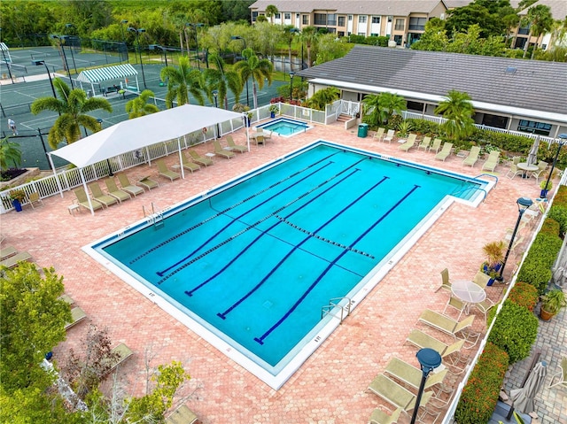 4852 Peregrine Point Cir N, Sarasota, FL 34231 - community pool featuring a hot tub