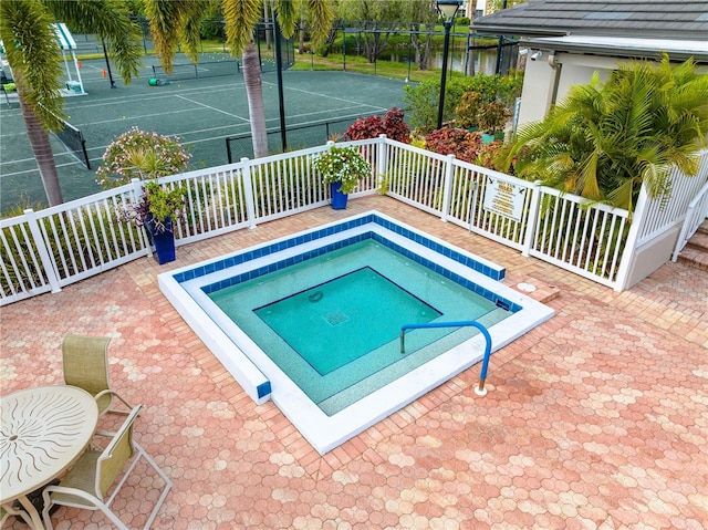 4852 Peregrine Point Cir N, Sarasota, FL 34231 - view of swimming pool with a hot tub
