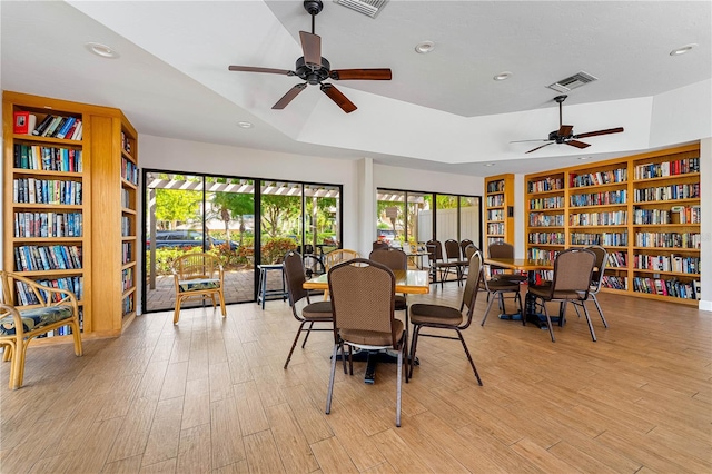 4852 Peregrine Point Cir N, Sarasota, FL 34231 - dining room with ceiling fan, recessed lighting, healthy amount of natural light, and light wood-type flooring