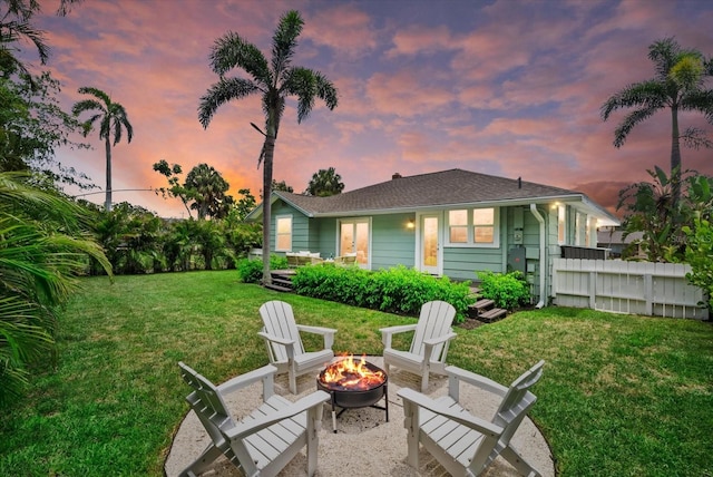 1051 Indian Beach Dr, Sarasota, FL 34234 - back of house featuring an outdoor fire pit