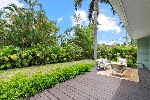1051 Indian Beach Dr, Sarasota, FL 34234 - deck with a lawn and an outdoor living space