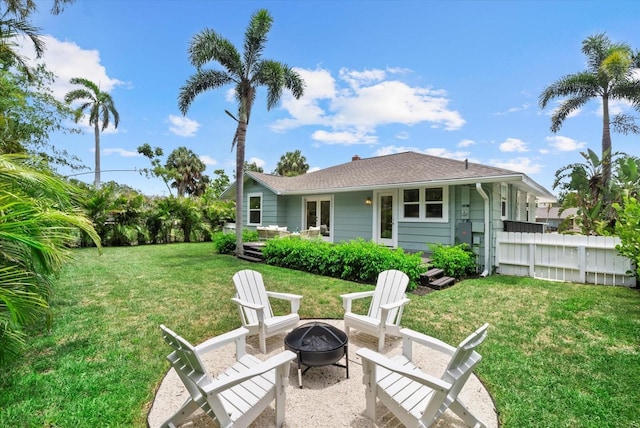 1051 Indian Beach Dr, Sarasota, FL 34234 - back of house with a fire pit
