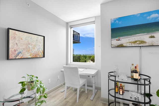 800 N Tamiami Trl Unit 405, Sarasota, FL 34236 - office space with wood finished floors and a water view