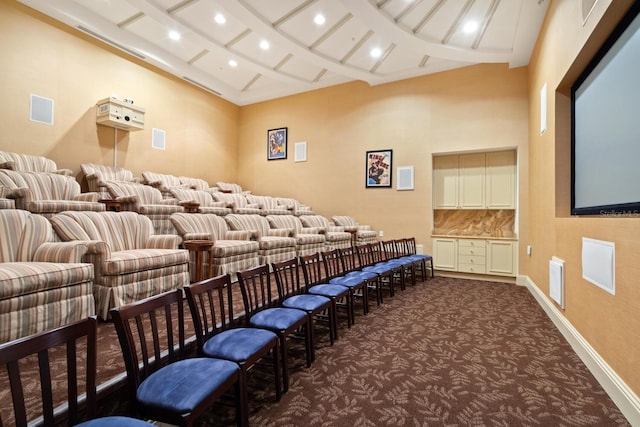 800 N Tamiami Trl Unit 405, Sarasota, FL 34236 - home theater room featuring dark colored carpet, high vaulted ceiling, beamed ceiling, and recessed lighting