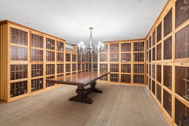 800 N Tamiami Trl Unit 405, Sarasota, FL 34236 - wine area with a chandelier and a wall mounted AC