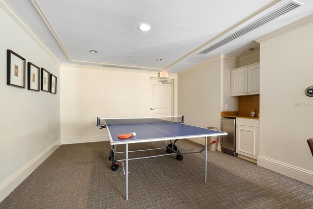 800 N Tamiami Trl Unit 405, Sarasota, FL 34236 - game room featuring dark carpet, ornamental molding, and recessed lighting