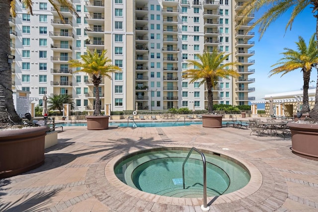 800 N Tamiami Trl Unit 405, Sarasota, FL 34236 - community pool with a hot tub and a patio area