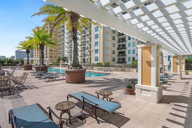 800 N Tamiami Trl Unit 405, Sarasota, FL 34236 - community pool featuring a pergola and a patio