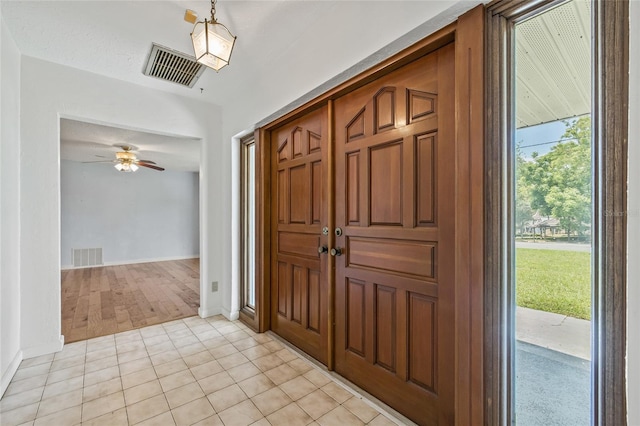 6103 6th Ave NW, Bradenton, FL 34209 - foyer entrance featuring a ceiling fan and light tile patterned floors