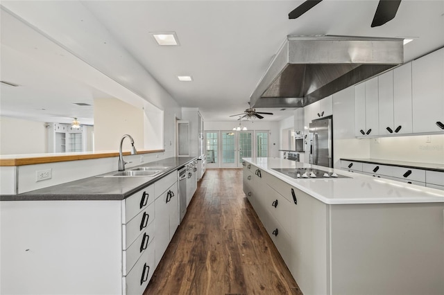 6103 6th Ave NW, Bradenton, FL 34209 - kitchen with a ceiling fan, stainless steel appliances, a center island, and dark wood-type flooring