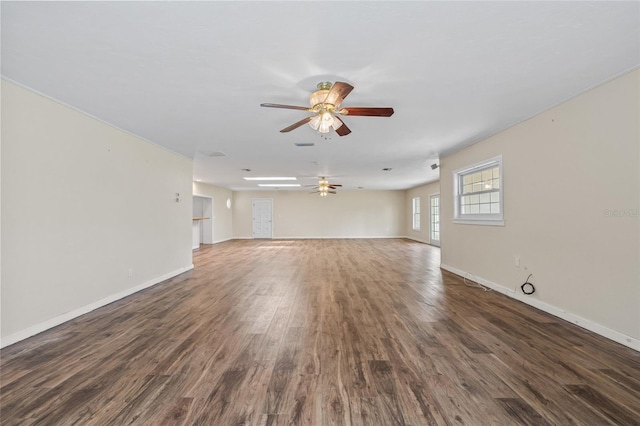 6103 6th Ave NW, Bradenton, FL 34209 - unfurnished living room featuring a ceiling fan and wood finished floors