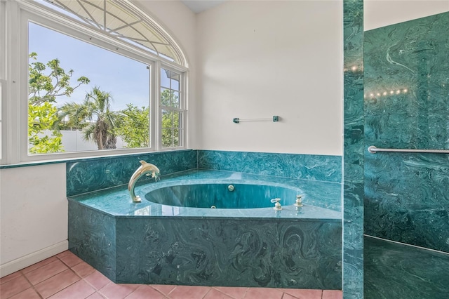 6103 6th Ave NW, Bradenton, FL 34209 - full bathroom with a jetted tub and tile patterned flooring