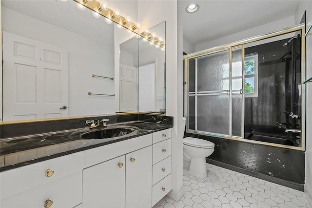 6103 6th Ave NW, Bradenton, FL 34209 - bathroom with vanity, tile patterned floors, and shower / bath combination with glass door