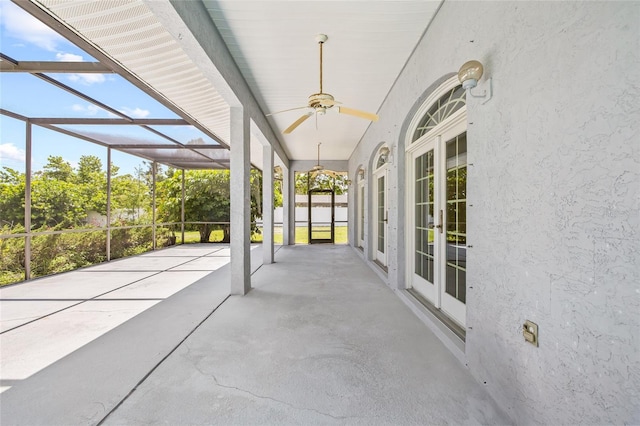 6103 6th Ave NW, Bradenton, FL 34209 - view of patio / terrace with a ceiling fan, french doors, and glass enclosure