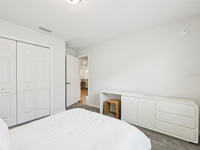 6528 166th Pl E, Parrish, FL 34219 - carpeted bedroom with a closet and baseboards