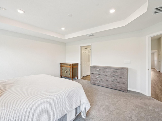 6528 166th Pl E, Parrish, FL 34219 - carpeted bedroom featuring recessed lighting and a tray ceiling