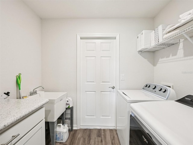 6528 166th Pl E, Parrish, FL 34219 - laundry room featuring washer and clothes dryer and dark wood-style flooring