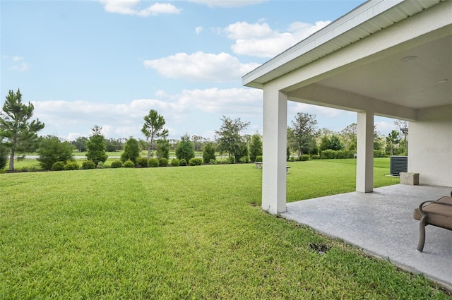 6528 166th Pl E, Parrish, FL 34219 - view of green lawn with a patio area
