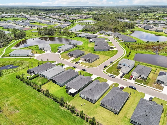 6528 166th Pl E, Parrish, FL 34219 - aerial perspective of suburban area featuring a large body of water