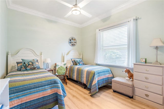 7521 Aralia Way, Seminole, FL 33777 - bedroom with light wood-style floors, crown molding, and a ceiling fan