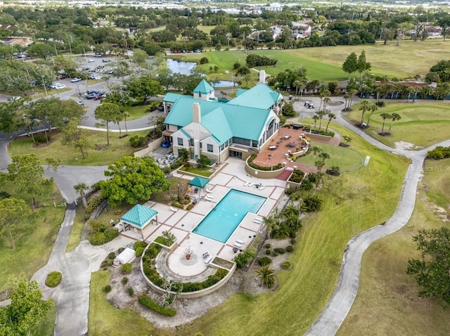 7521 Aralia Way, Seminole, FL 33777 - drone / aerial view of a pool and a golf course