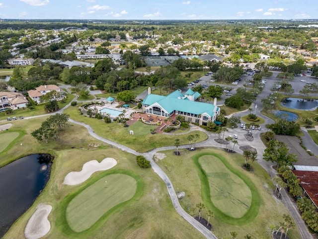 7521 Aralia Way, Seminole, FL 33777 - aerial view of property and surrounding area with a large body of water, a local golf course, and nearby suburban area